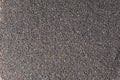 Background of black crushed anthracite grain with copy space for your text Royalty Free Stock Photo