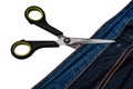 Background from blue jeans and a pair of scissors isolated on white background Royalty Free Stock Photo