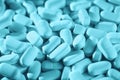 Background of blue monochrome tablets on the table Royalty Free Stock Photo