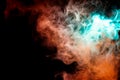 A background of blue, red and green wavy smoke in the shape of a Royalty Free Stock Photo