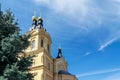 On the background of blue sky with Cirrus clouds visible Orthodox Church yellow color with Golden domes. Royalty Free Stock Photo