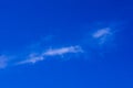 Background of a blue sky and a small cloud