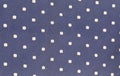 Background of blue tie with white speck. Royalty Free Stock Photo