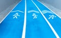 Background of blue track for running competition at stadium Royalty Free Stock Photo