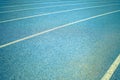 Background of blue track for running at stadium Royalty Free Stock Photo