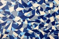 Background blue white tiles. Broken tiles on wall, floor. Beautiful decorative material for interior of house, building Abstract Royalty Free Stock Photo