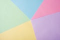Background of blue, yellow, pink, lilac sheets of paper