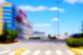 Background, blur, out of focus, bokeh. Office building with well-maintained parking blurred urban background. Royalty Free Stock Photo