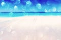 Background of blurred beach and sea waves with bokeh lights sand Royalty Free Stock Photo