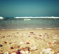 Background of blurred beach and sea waves, vintage filter.