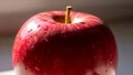 The background is blurred emphasizing the apple as the main subject Royalty Free Stock Photo