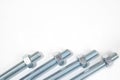 Bolts, steel galvanized with hex heads on white background Royalty Free Stock Photo