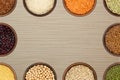 Background - bowls with various grains and beans form a frame Royalty Free Stock Photo