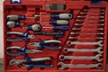 Background of a box with an open tool. A set of working tools lies in a red drawer. The tools are arranged in order in Royalty Free Stock Photo