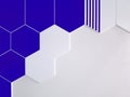 A background of bright blue and white ceramic tiles in the shape of a hexagon that partially covers a white wall Royalty Free Stock Photo