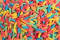 Background of bright gummy worm candies Royalty Free Stock Photo