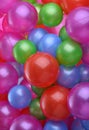 Background of brightly colored plastic balls