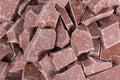 Background of brown chocolate pieces