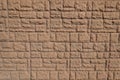 Background - brown brick veneer wall with random layout Royalty Free Stock Photo