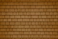Background of brown wood shingles. Texture wooden roof Royalty Free Stock Photo