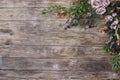 Background of brown wooden planks and flowers