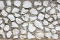 White irregular shape stones building wall