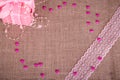 Background of burlap with pink gift box