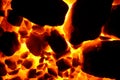 Background of burning and flaring pieces of coal anthracite of different fractions. Royalty Free Stock Photo