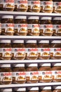 Background with cans of chocolate nutty pasta Nutella attractions of the city Market Sarona . Royalty Free Stock Photo