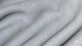 A gray wavy 3D fabric.