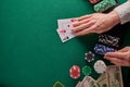 Background for a casino, poker table the player holds a pair of aces. With space