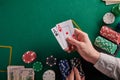Background for a casino, poker table the player holds a pair of aces. With space Royalty Free Stock Photo