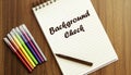 Background Check. your future target searching, a marker, pen, three colored pencils and a notebook for writing Royalty Free Stock Photo