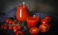 Glass of tomato juice on a dark background, drink, jug, cherry tomatoes, healthy, health, fresh tomatoes, vegetables