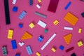 Background for children`s site, for the menu. Children`s constructors on pink. Multi-colored cubes. Games for motor developing mem Royalty Free Stock Photo