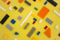 Background for children`s site, for the menu. Childrens constructors on yellow. Multi-colored cubes. Games for motor developing me Royalty Free Stock Photo