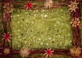 Background for Christmas greeting card- holiday straw decoration, green color textured fabric