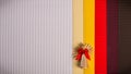 Background for Christmas greeting card- holiday straw decoration, red and claret textured paper Royalty Free Stock Photo