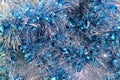 The background of Christmas tinsel blue Royalty Free Stock Photo