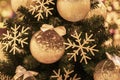 Background of Christmas tree balls and snowflakes, light golden decorations close-up. Winter, Happy New Year, xmas. Royalty Free Stock Photo