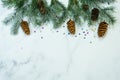 Background of the Christmas tree. Christmas background with a Christmas tree on a white marble background.