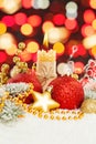 Background Christmas. Xmas composition with candle, green Xmas tree branch and New Year decoration Royalty Free Stock Photo