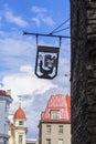 Background cityscape sign with angry muse in Tallinn