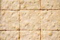 Background of classic homemade square shortbread biscuits from a