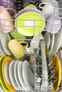 Background of clean dishes in dishwashing machine, front view