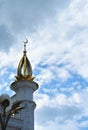 A background with clouds and a tower of Kul Sharif Mosque, one of the largest mosques in Russia Royalty Free Stock Photo