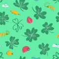 Background with clover leaves and insects. Seamless pattern with Royalty Free Stock Photo