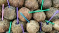 Background of coconut with colorful plastic cocktail drinking tubes Royalty Free Stock Photo
