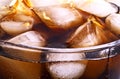 Background of cola with ice and bubbles Royalty Free Stock Photo