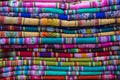 Background of colored fabrics from Indian ethnic market Royalty Free Stock Photo